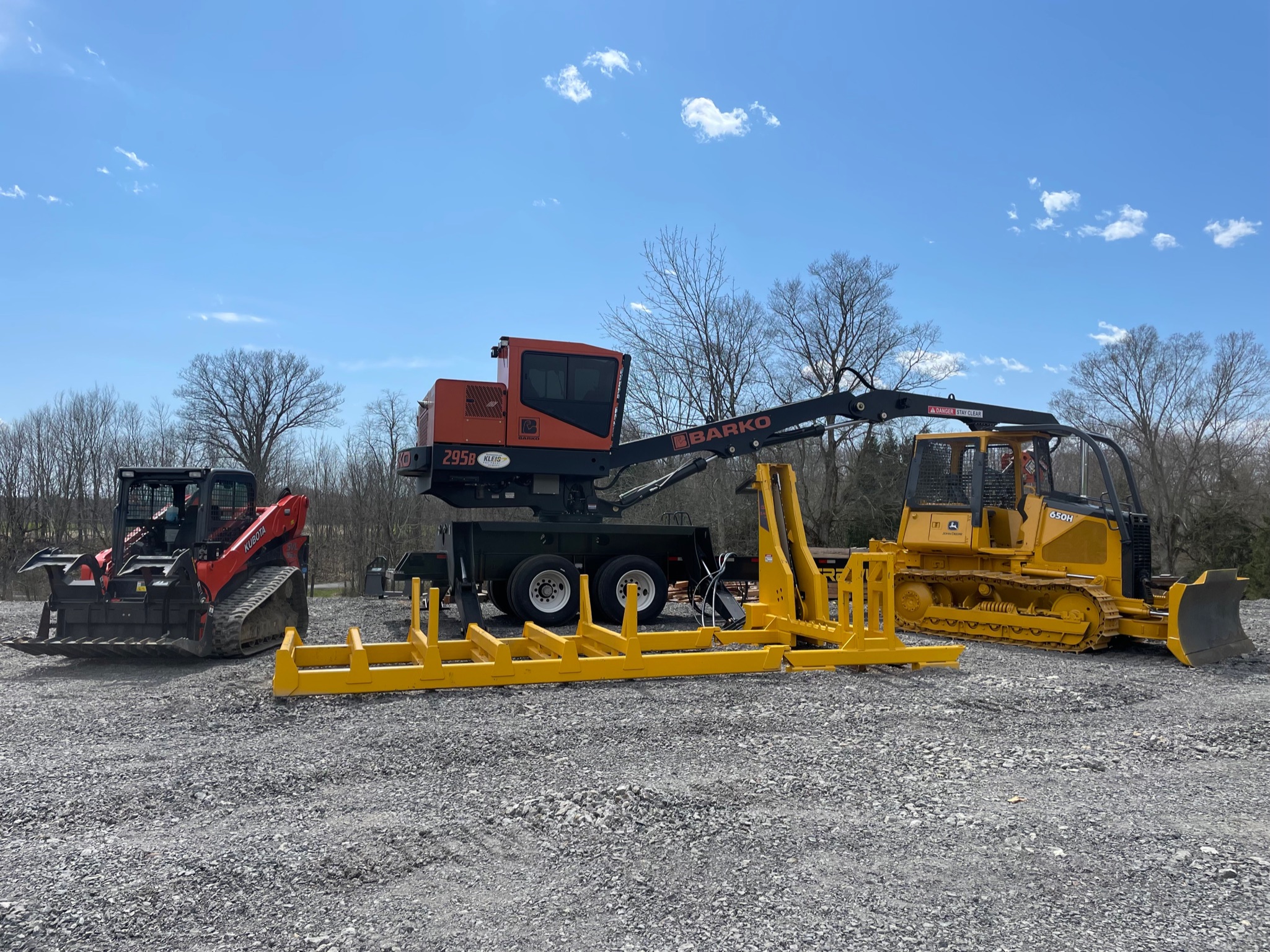 Heavy machinery and logging equipment on site